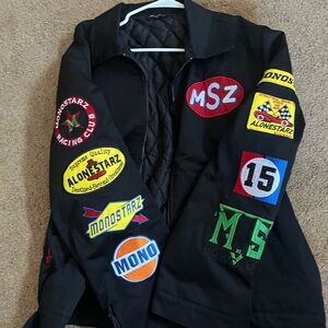 Black Quilted Jacket by Moschino